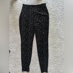 Black with shiny sparkles. Tube top and pants. Size small